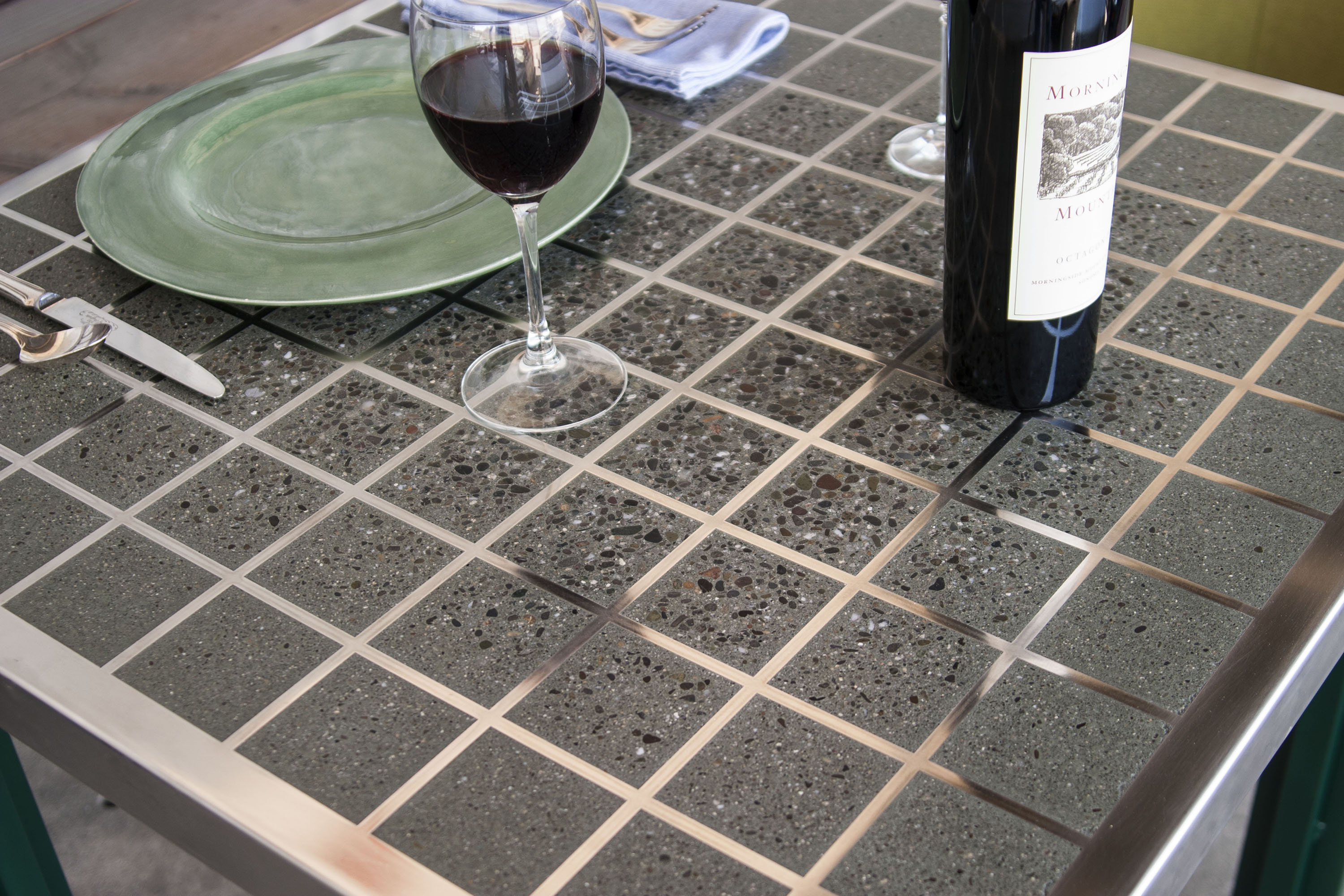 Chicago Bridge Concrete Table Top with Lasercut Steel Grid and Steel Legs